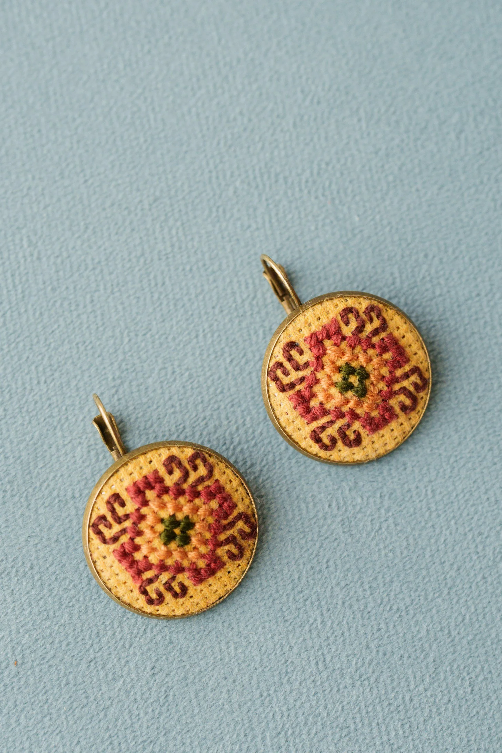 Carpet crosstitch earrings.jpg