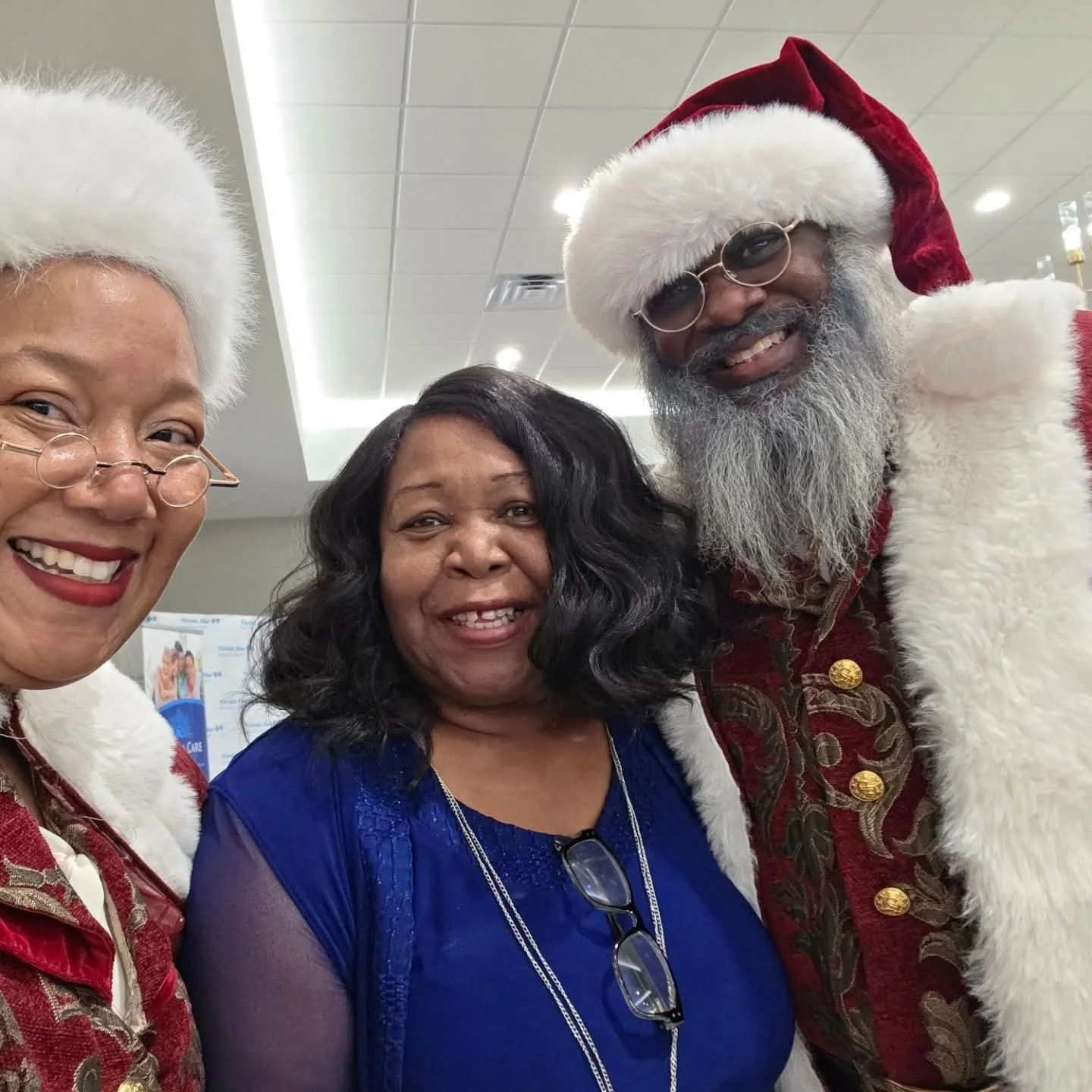 Gerrie Ford-Hardin takes a picture at the annual Joan Turner Senior Luncheon which she organizes every year to provide thanksgiving dinners to hundreds of seniors.