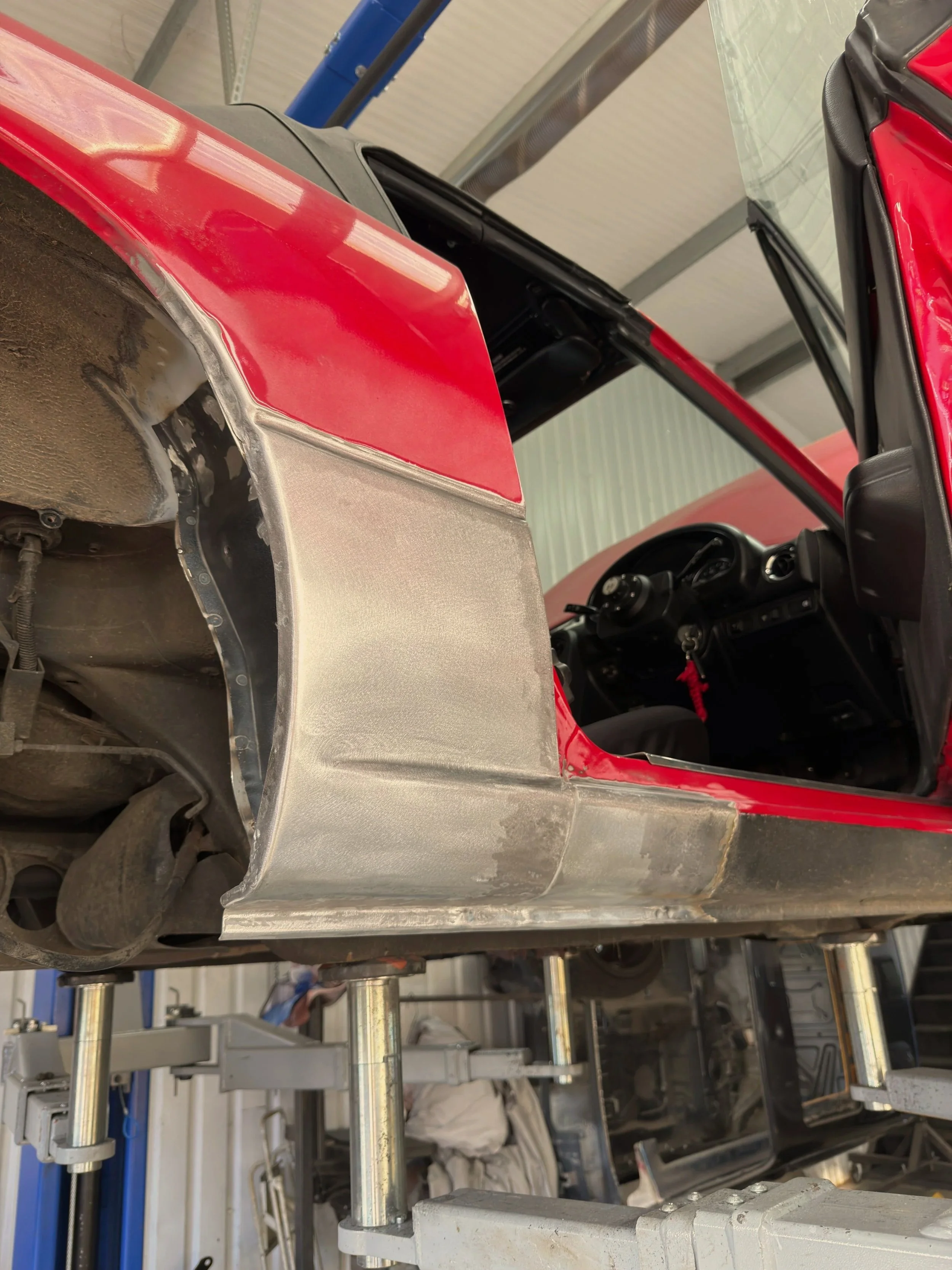 A picture of the process of repairing an MX5 Mazda Miata Eunos Mk1 sill and rear arch