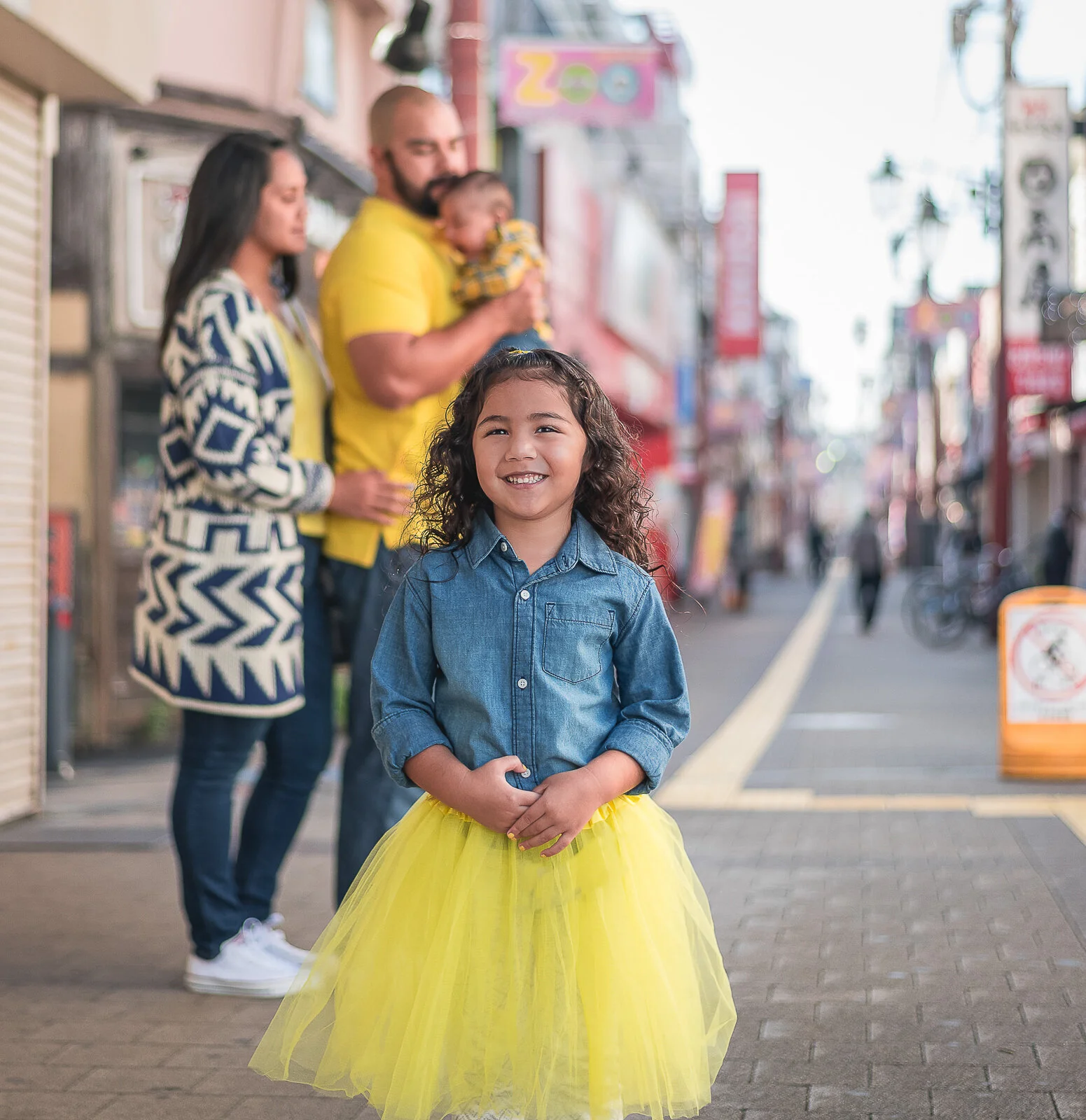 Family portraits walking around Japan- Colorful and sweet moments. Family portraits capturing colorful, sweet moments while exploring Japan. Karen Fabiola is a destination photographer based between Cabo Rojo, Puerto Rico, and north Florida. 