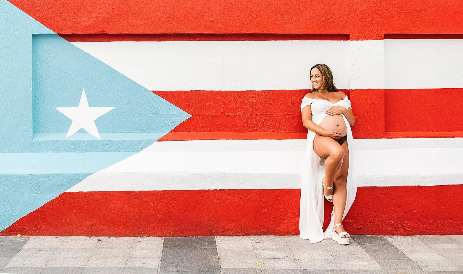 Maternity photo with the Puerto Rico flag