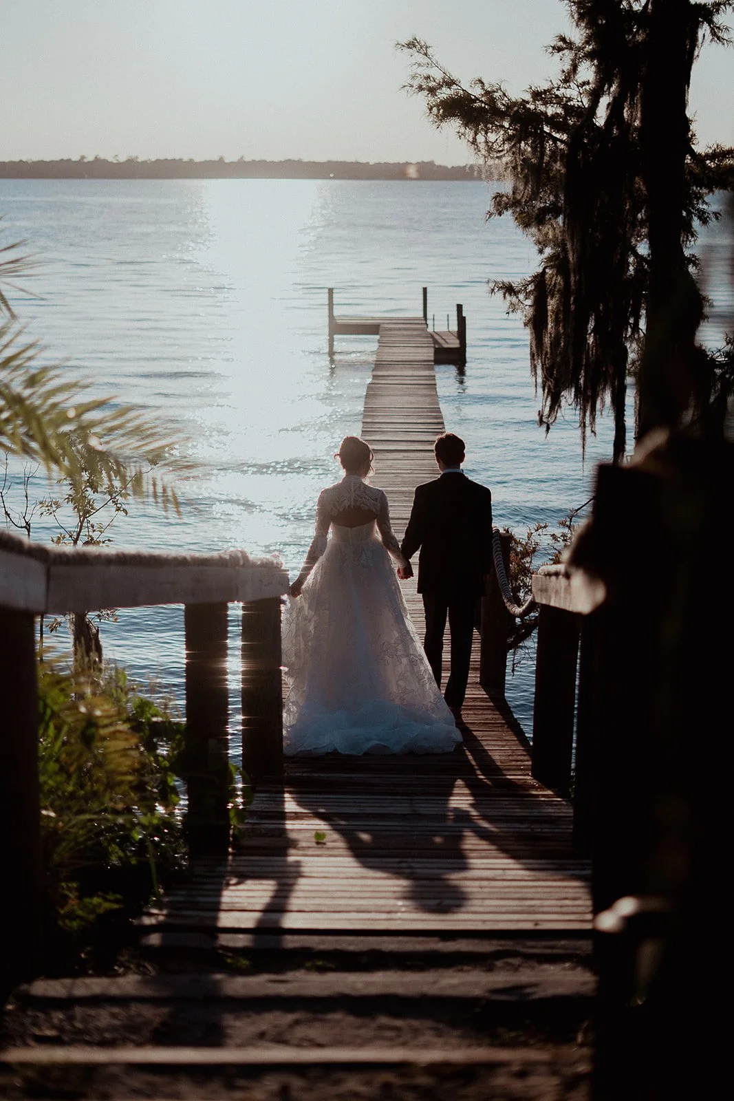 Bride and groom walking hand in hand during their intimate Cabo Rojo, Puerto Rico elopement – captured by Karen Fabiola Photo, destination wedding photographer