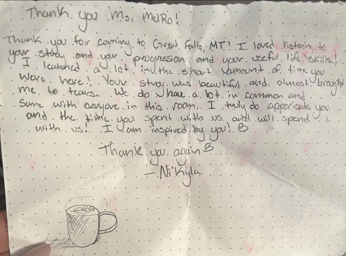 A handwritten thank you note on dotted paper with a small sketch of a coffee mug at the bottom left corner, expressing gratitude to Miss Melro for visiting Great Falls, Montana.