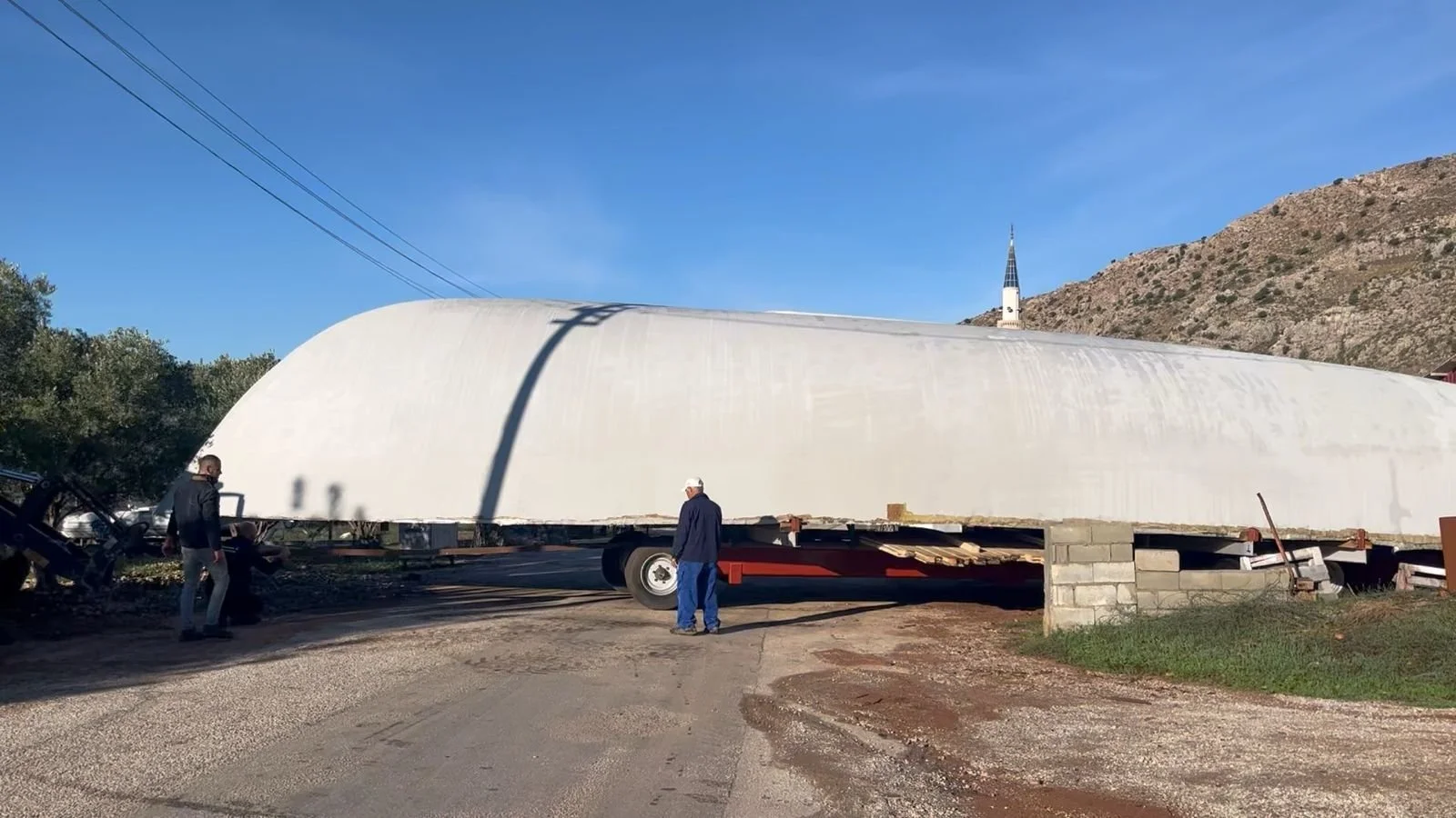 The hull on the move again in preparation for Turnover and being united with keel.