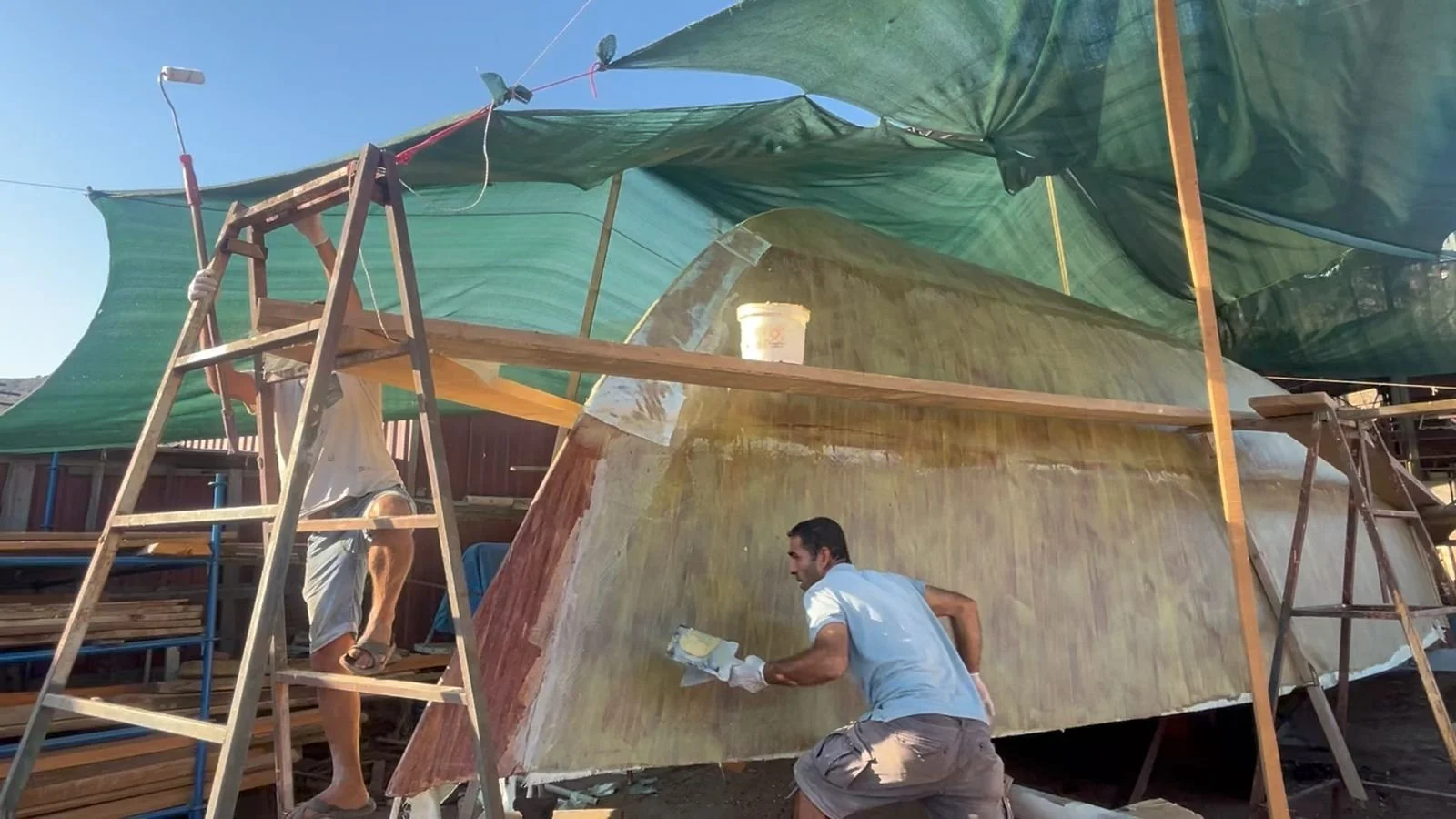 Extra layers of glass cloth and epoxy added to the bow section