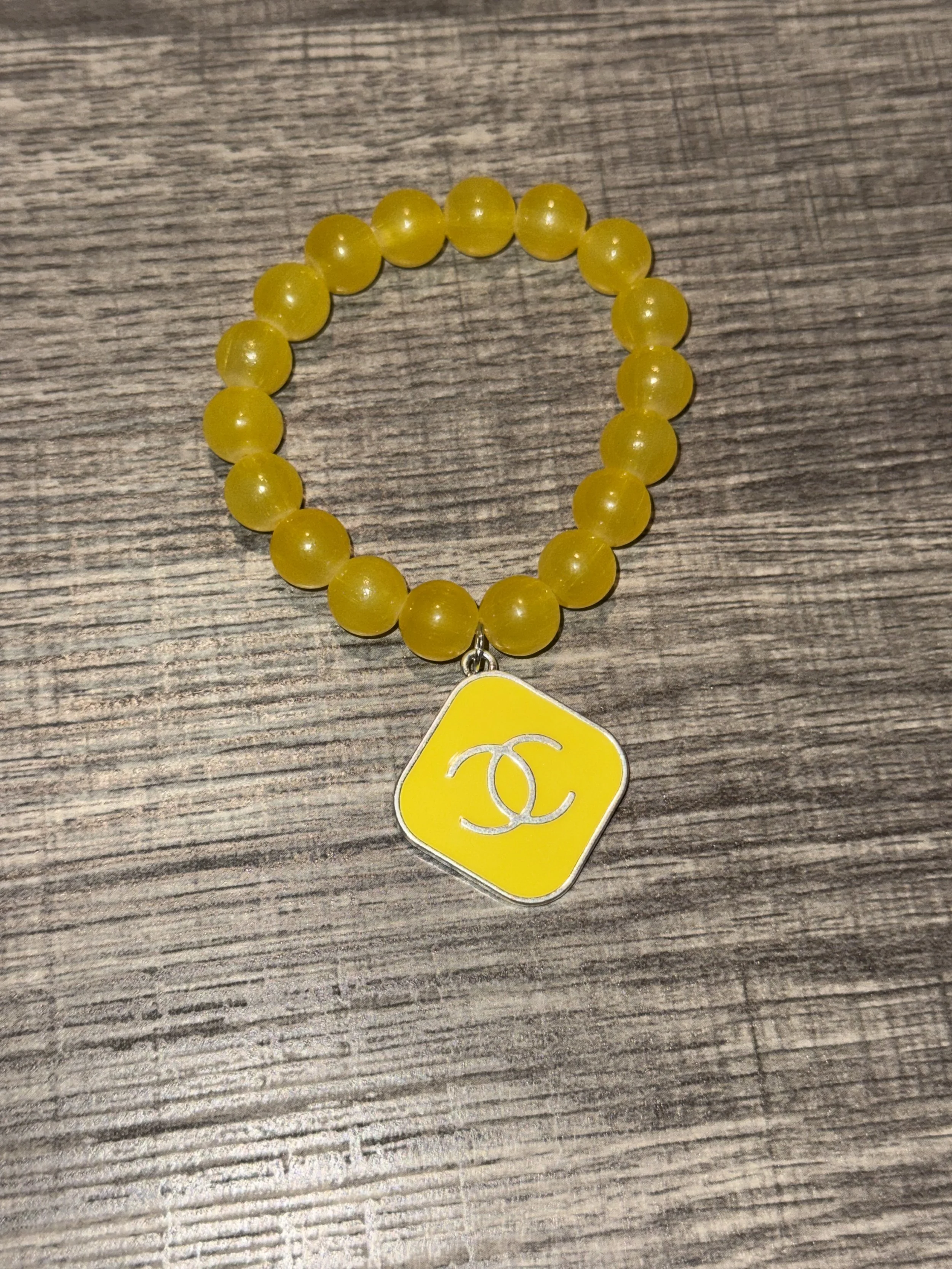 Radiant Yellow Beaded Bracelet with Pendant