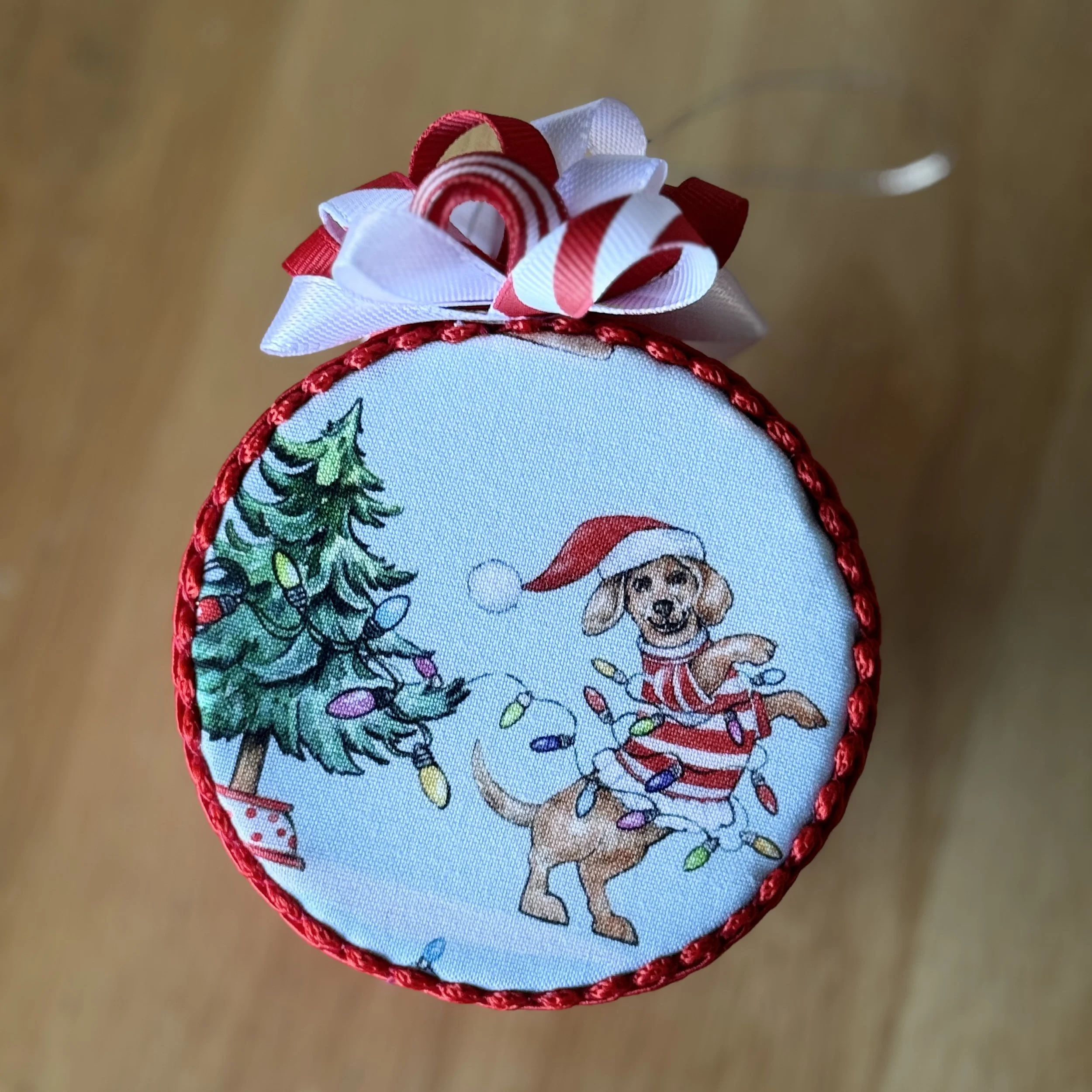 Festive Dog Ornament with Red Trim