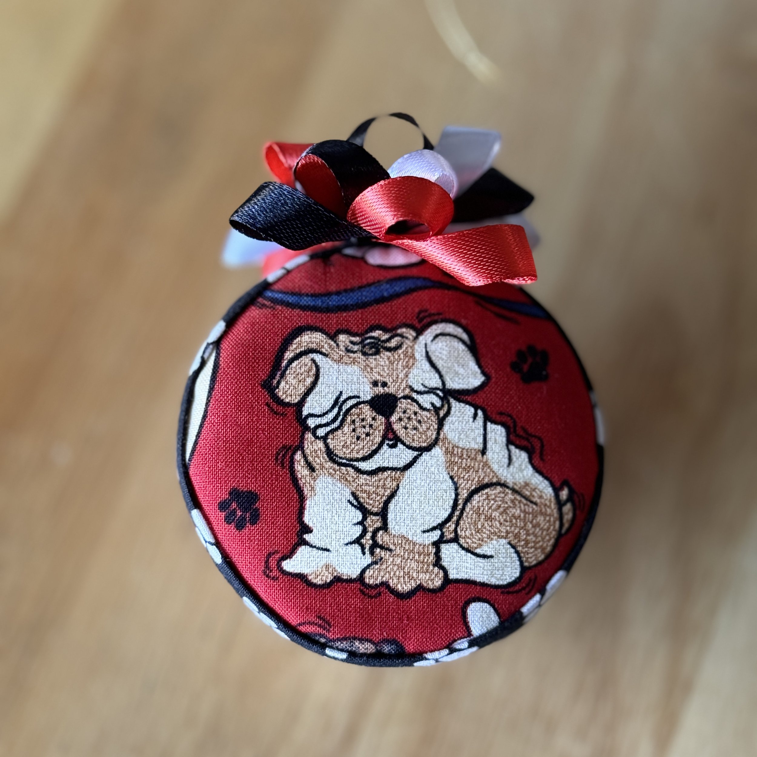 Charming Dog Ornament with Paw Print Design