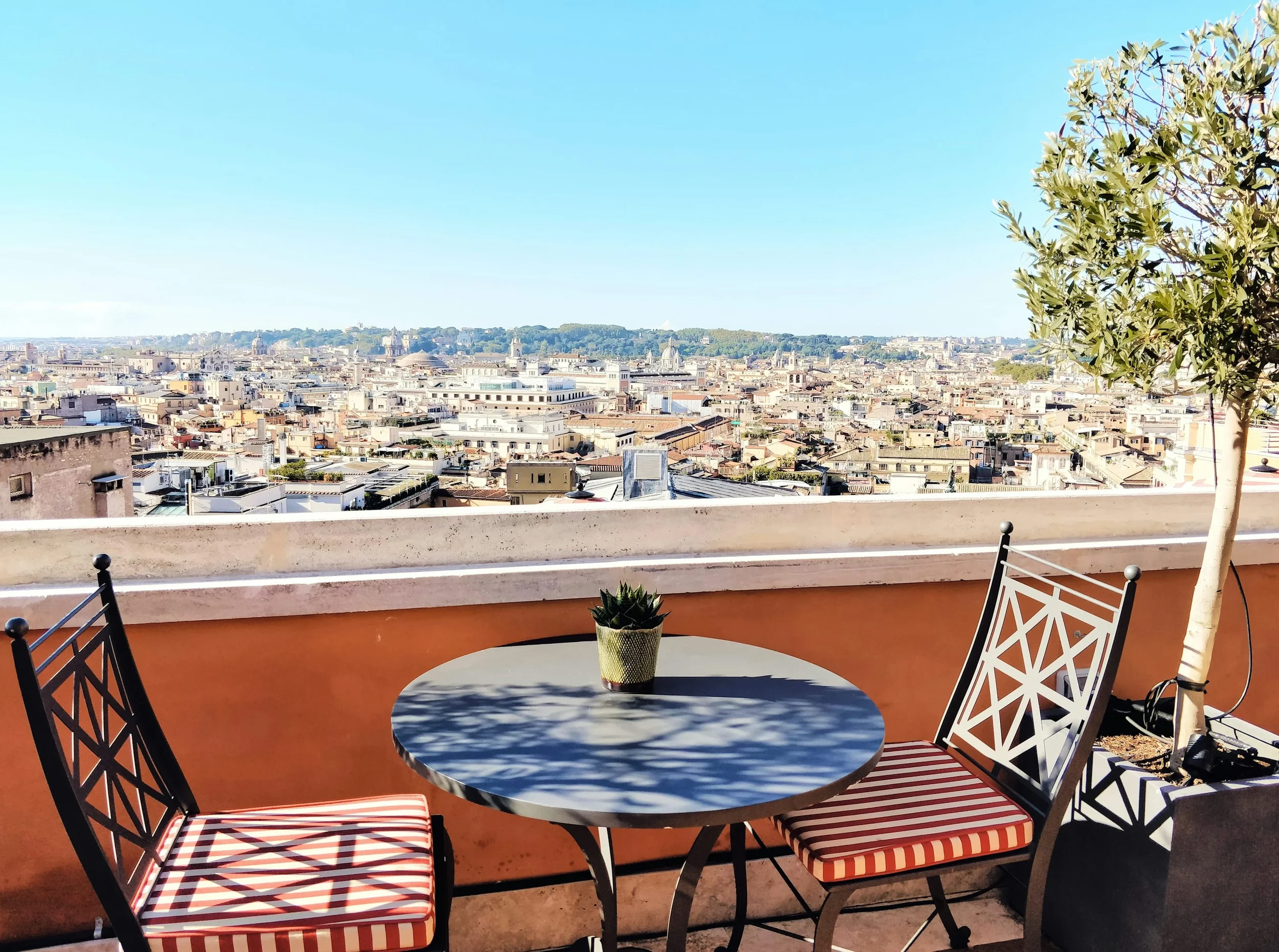 An intimate al fresco table overlooking the Florence skyline — capturing the essence of Quiet Luxury and forensic travel design by Bellavita.