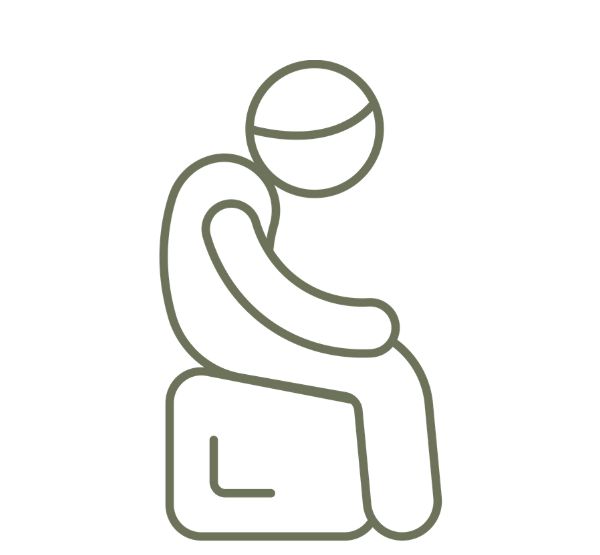 Line drawing of a person sitting on a box or stool with head bowed, arms resting on knees.