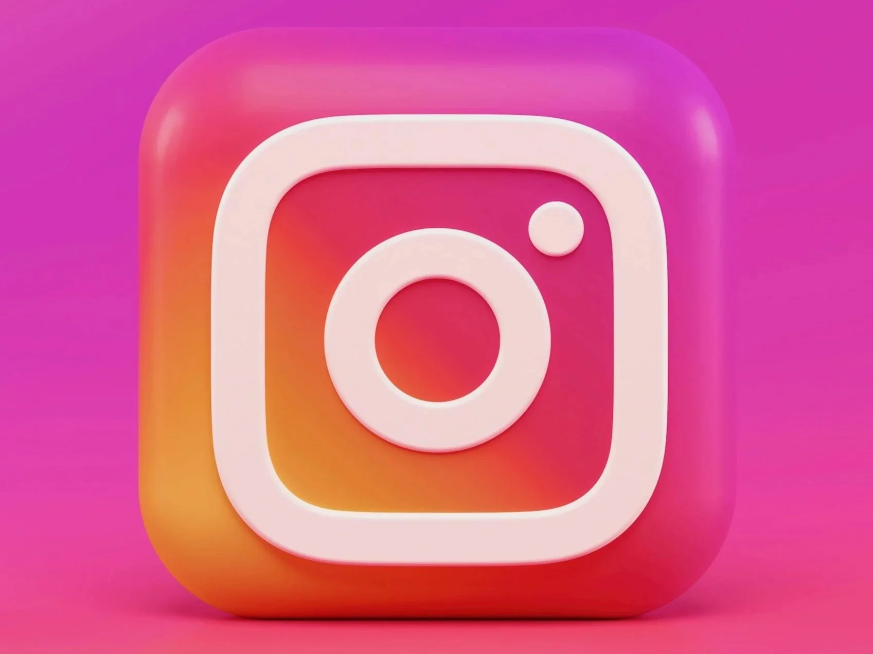 Logo di Instagram con sfondo rosa e arancione