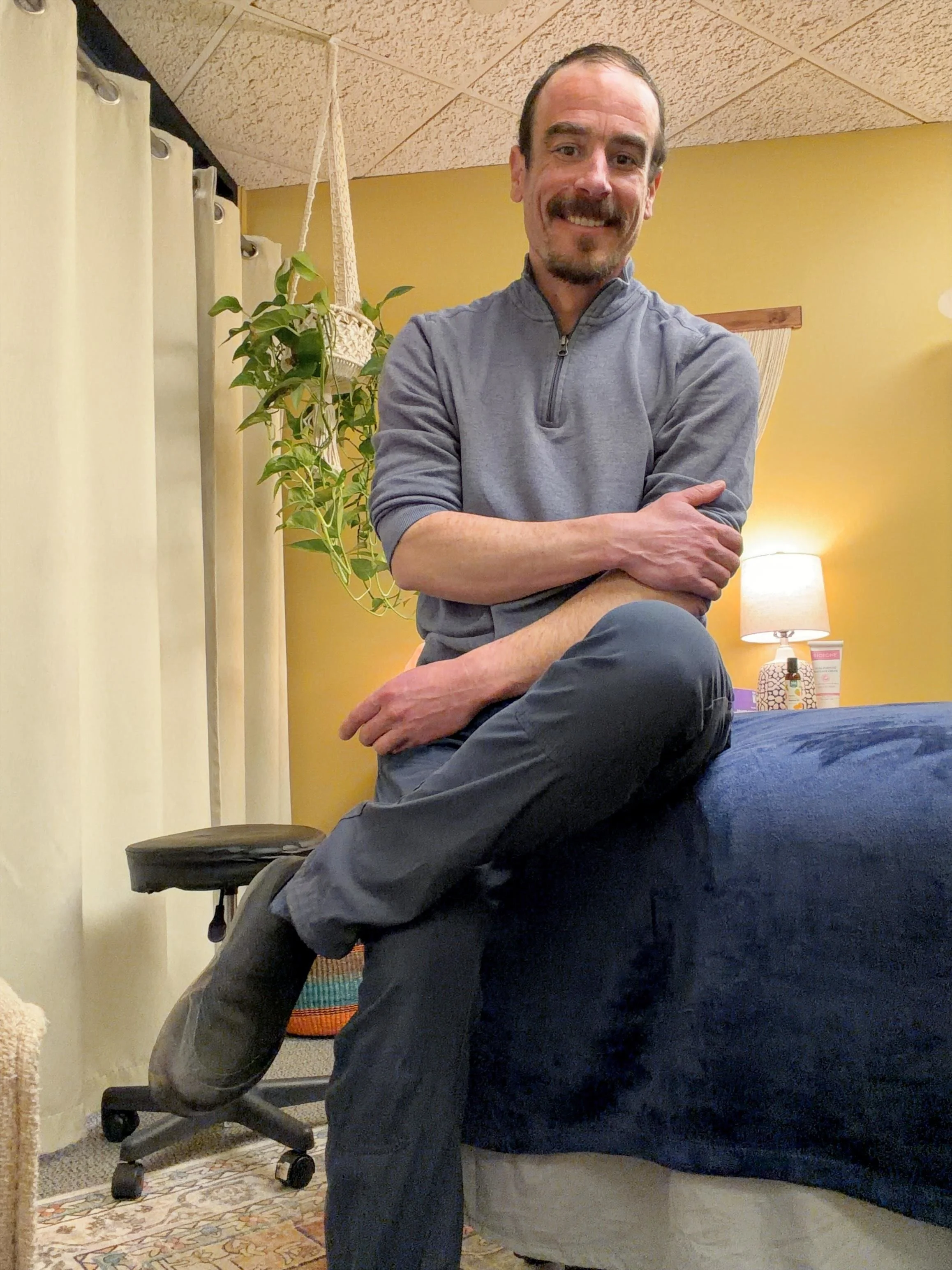 Lao Kemper, LMT, CMT in his Boulder, Colorado treatment office at the Boulder healing hub offering services for Boulder Pain Relief Massage, LLC.