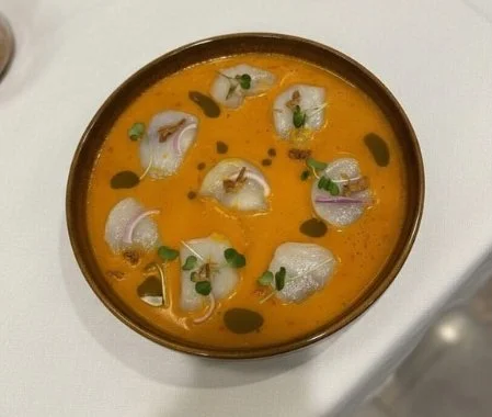 Scallop crudo, blood orange-calabrian chili vinaigrette