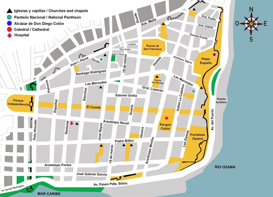 Map of a city showing landmarks including churches, a national pantheon, a cathedral, a hospital, parks, and plazas, with streets and the river along the coastline.