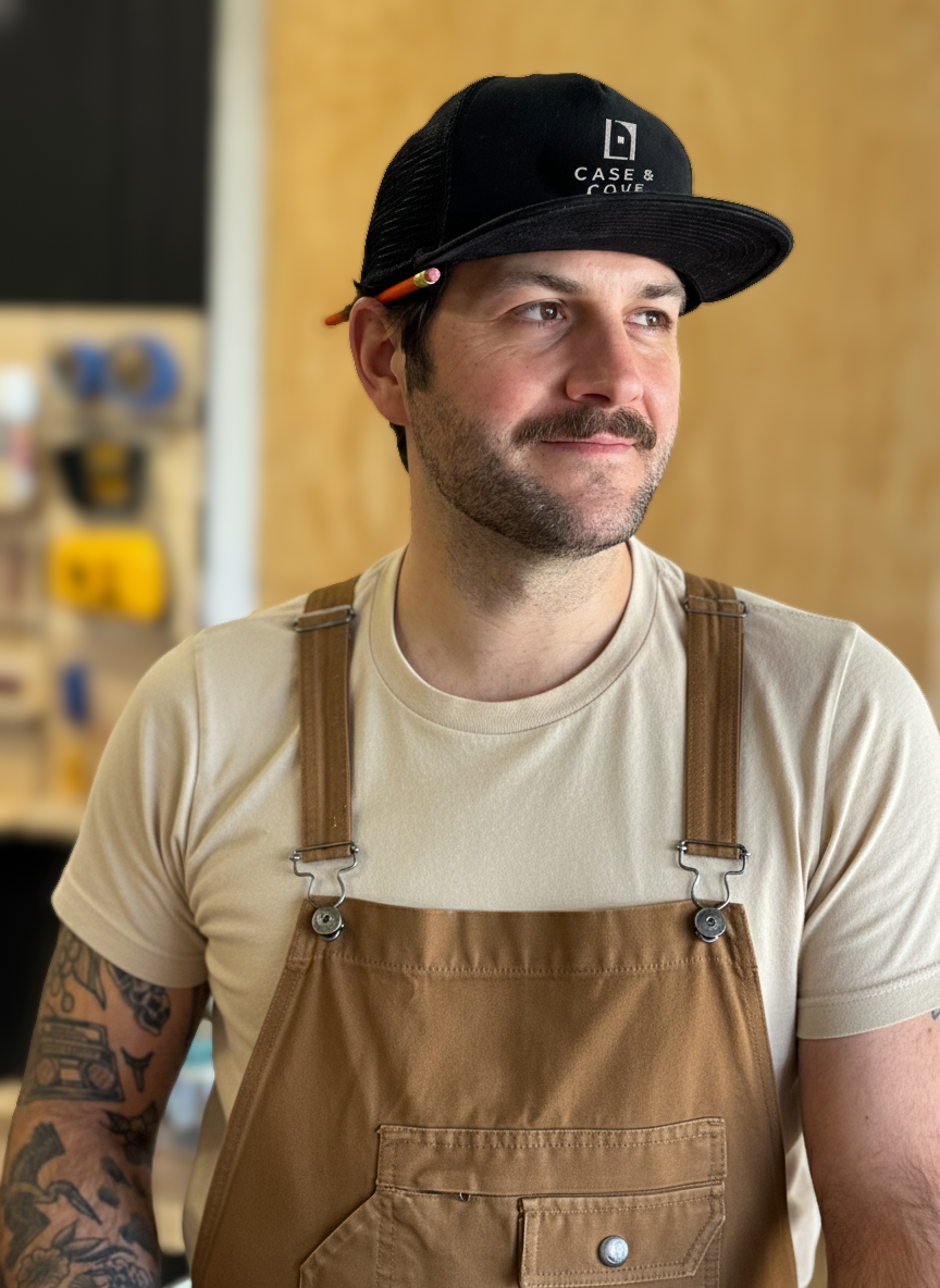 Mark Forest — the owner of Case & Cove — in his workshop.