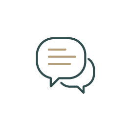 Communication icon, two speech bubbles, one with lines representing text, overlapping each other.