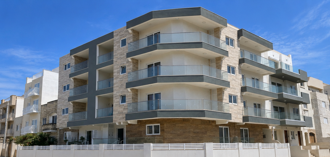 Modern multi-story apartment building with glass balconies in front of a blue sky.