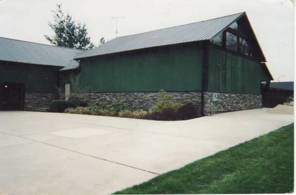 Customer Barn after Tree removal and Cultured stone base put in