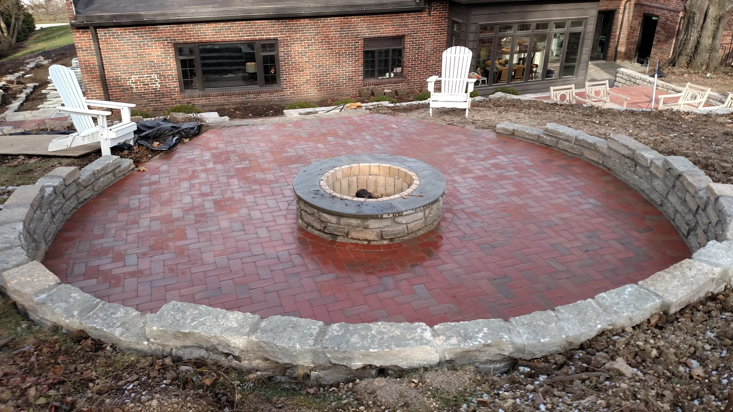 Stone fire ring and retaining wall stone job.jpg