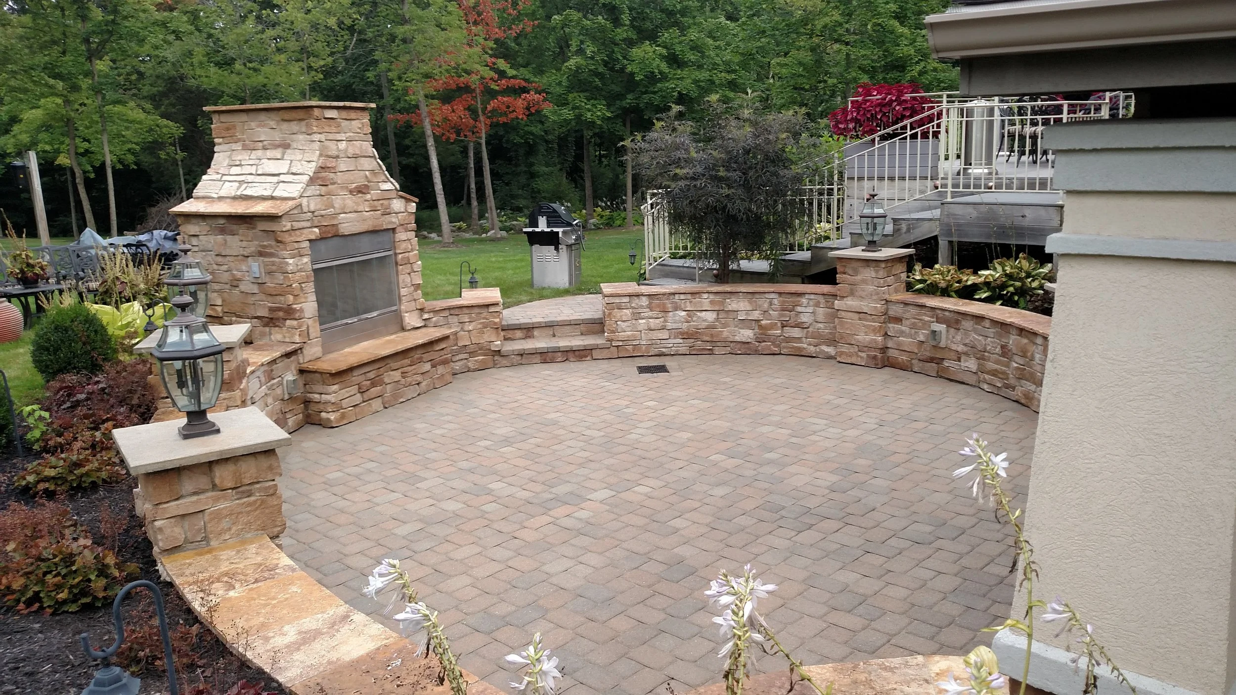 Stone paver patio - stone fire place outside.jpg