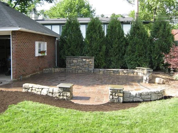 2020patiostonesidingwall.JPG