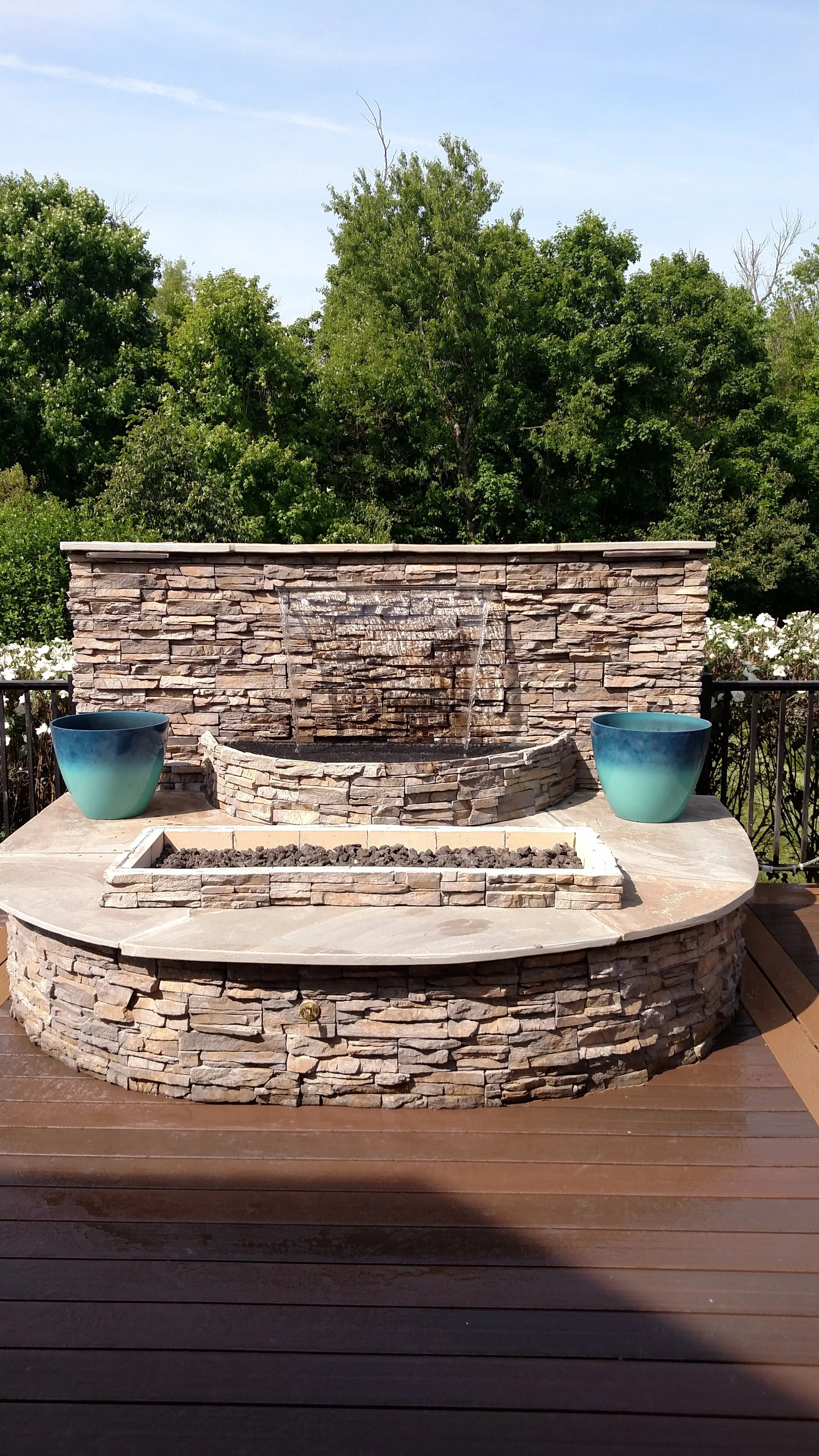 Stone water fixture or feature during day - stone around water.jpg