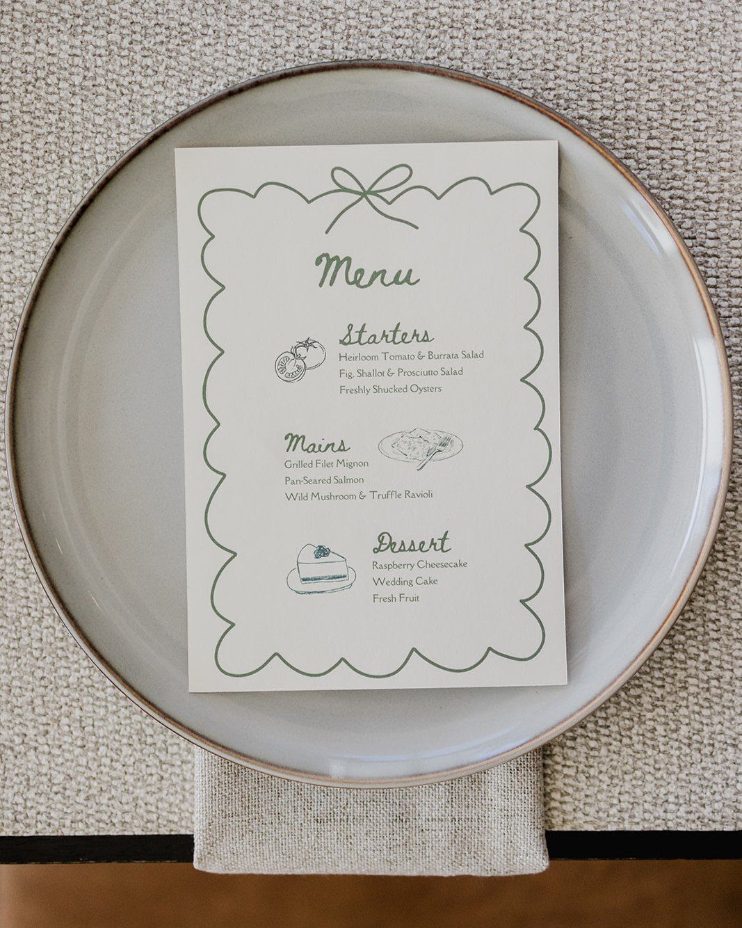 A thoughtfully designed menu does more than share what's being served.

Let's be honest &mdash; after RSVPing months in advance, most guests have forgotten what they ordered anyway.

Custom menus add both function and beauty to the table, creating a 