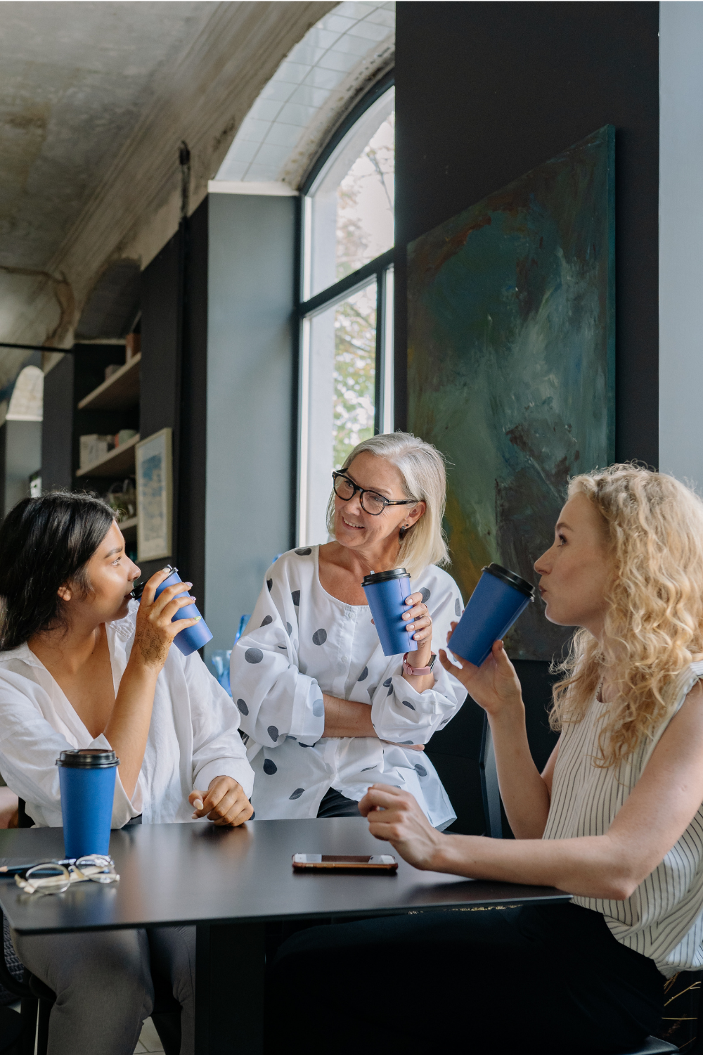Midlife Group of Women Supporting and Talking