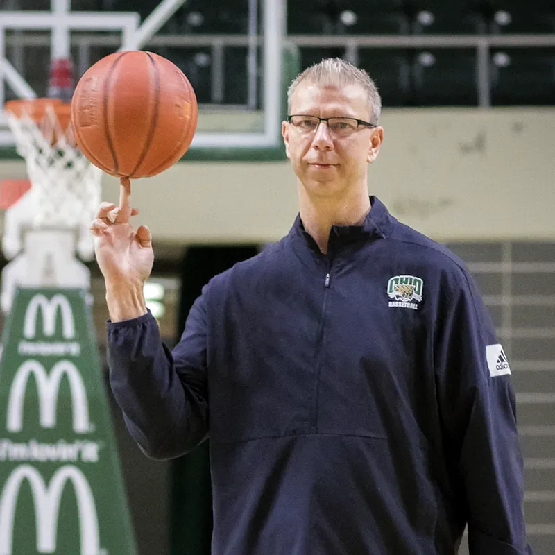 Jeff Boals spinning a basketball on finger