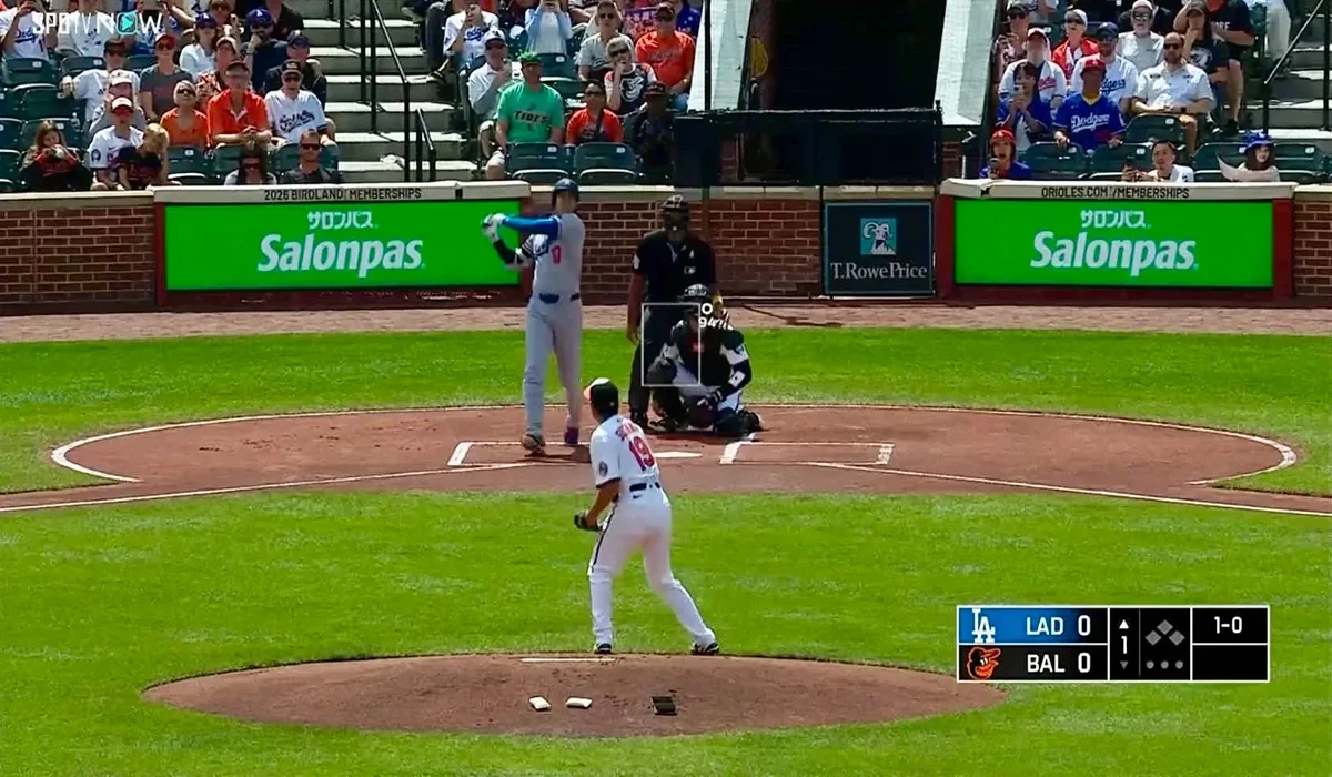 MLB televised game with Salonpas advertising behind home plate