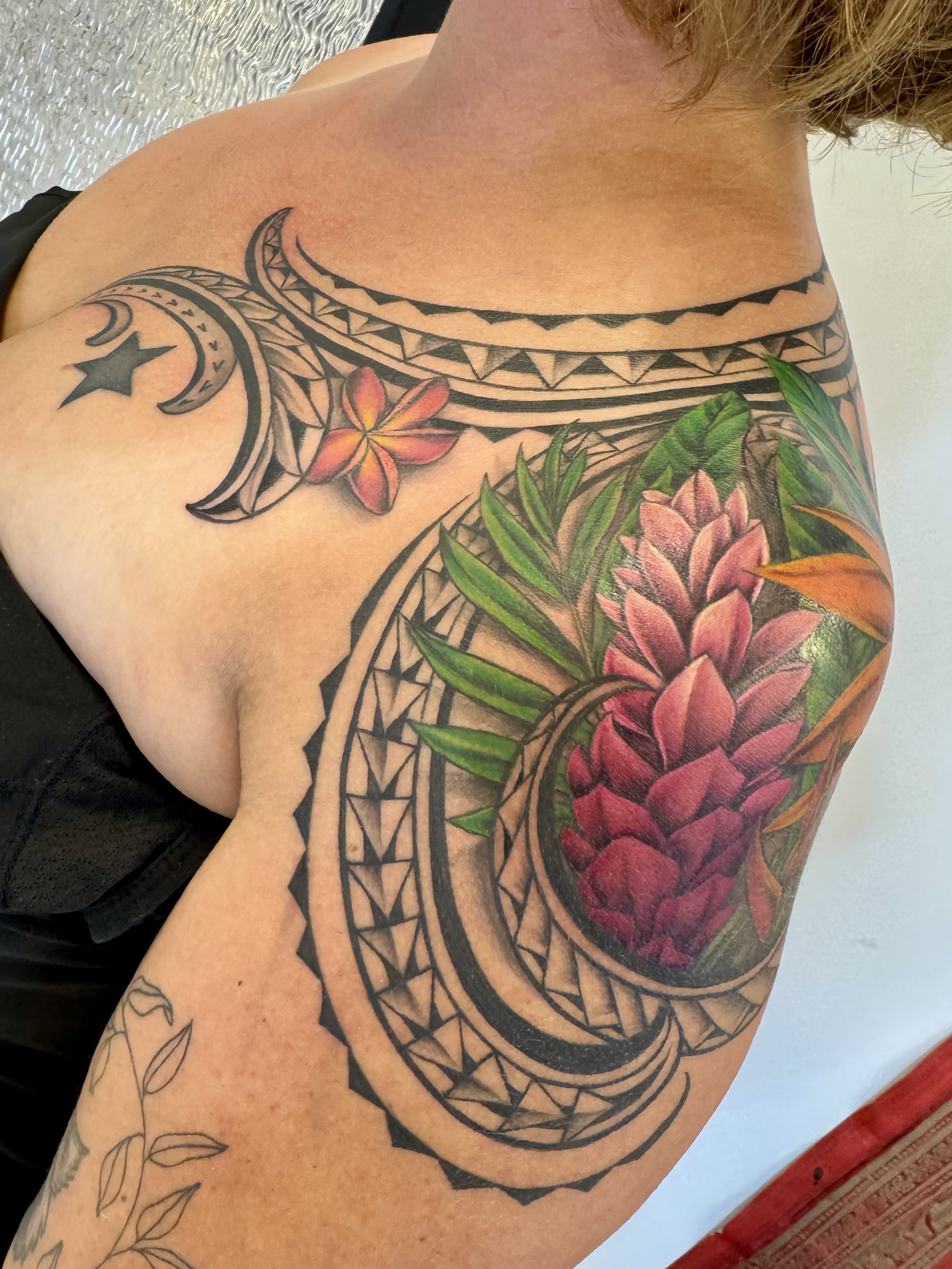 Shoulder floral color ginger polynesian plumeria Monarch Tattoo Hawaii.jpeg
