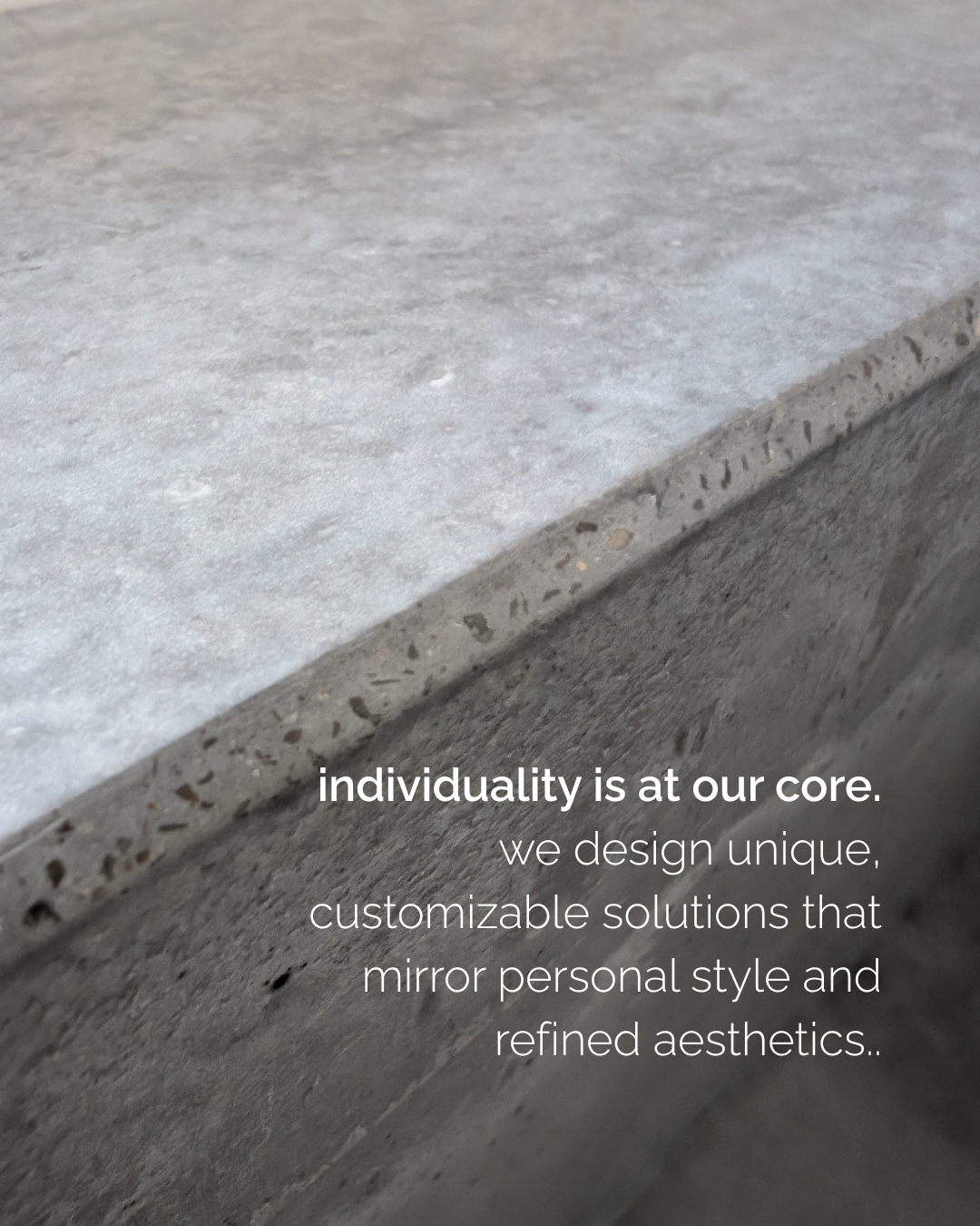 Close-up of a granite countertop with text overlay describing personalized, durable design solutions.