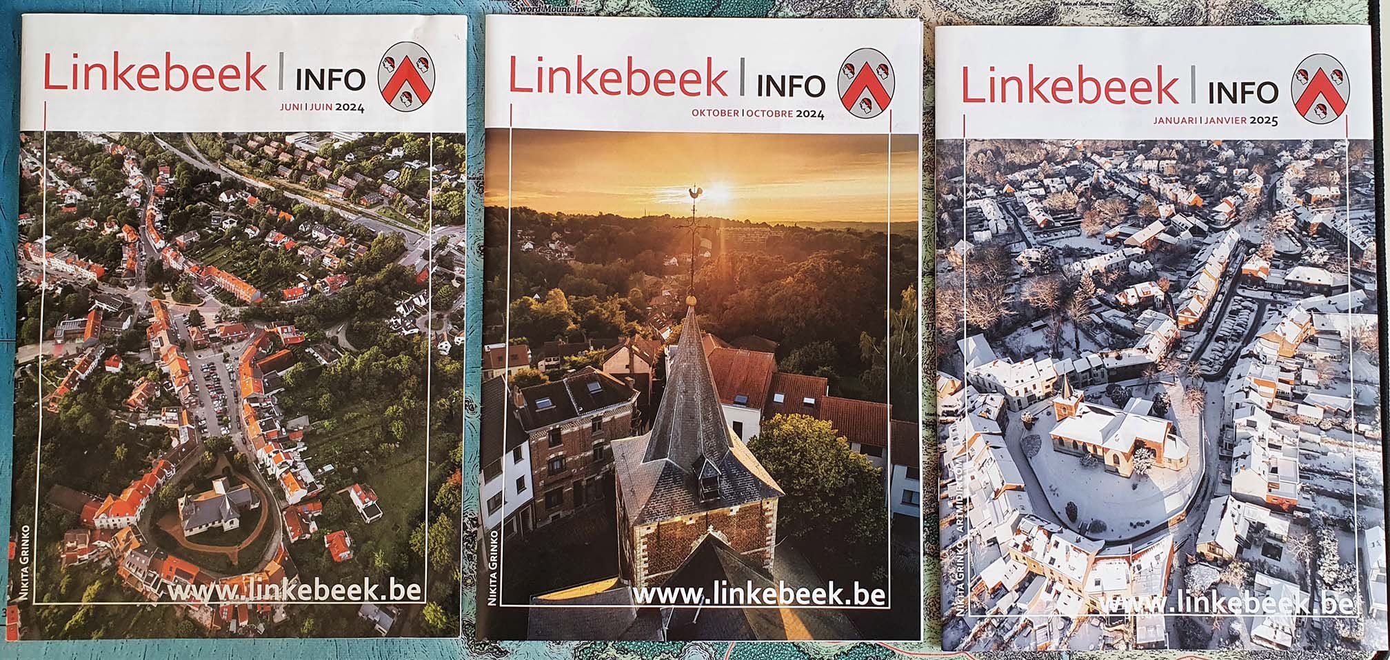 Three aerial view magazine covers of Linkebeek, Belgium, from June 2024, October 2024, and January 2025. Each shows different landscapes: residential neighborhoods, a church steeple with sunset, and snowy rooftops.