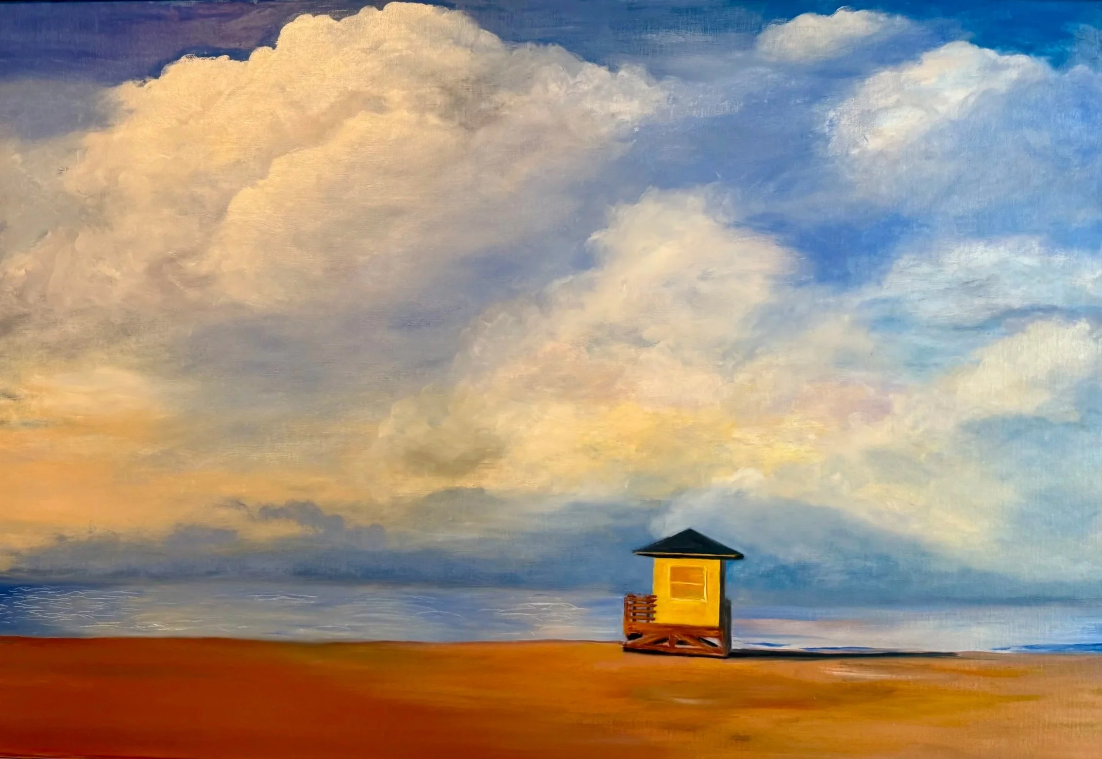 A painting of a small yellow and black lifeguard tower on sandy ground with a vast sky filled with large, colorful clouds in shades of blue, white, gray, and peach.
