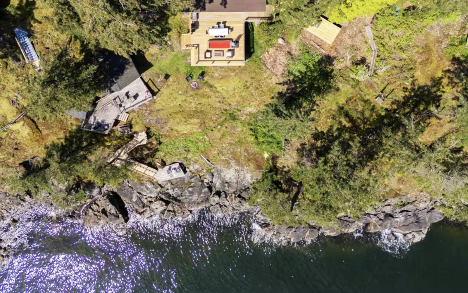 Aerial view of the Salt and Arbutus Cabins and our sea shore. 