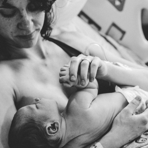 Mother and baby in hospital during postnatal care