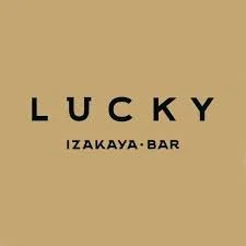 Logo with the word 'LUCKY' and 'IZAKAYA BAR' underneath on a beige background.