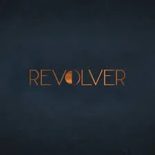 The word 'REVOLVER' written in orange letters on a dark background.