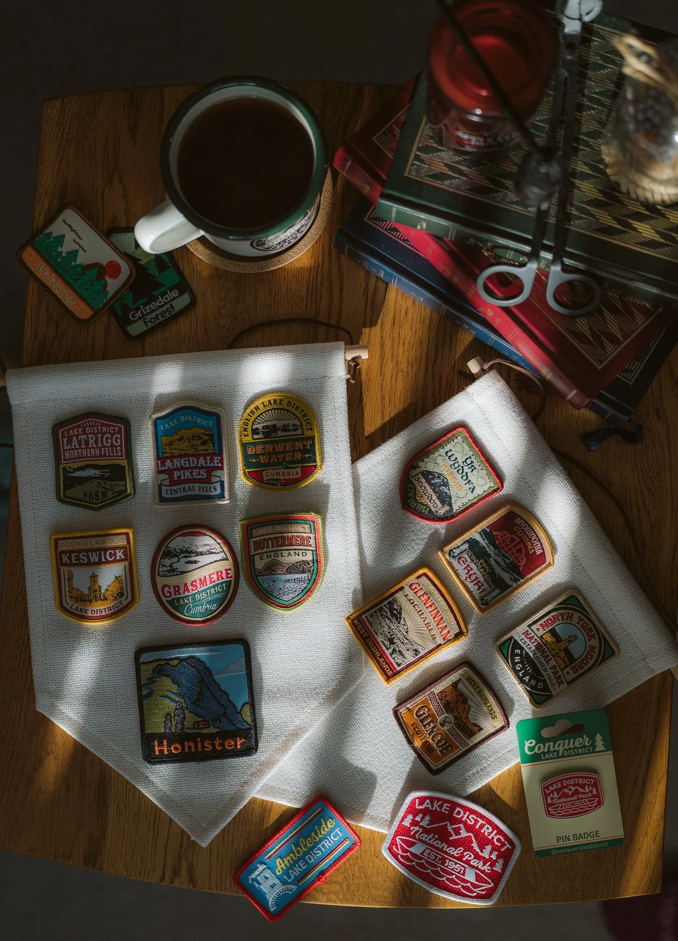 Adventure Patch company patches flat lay in cosy setting