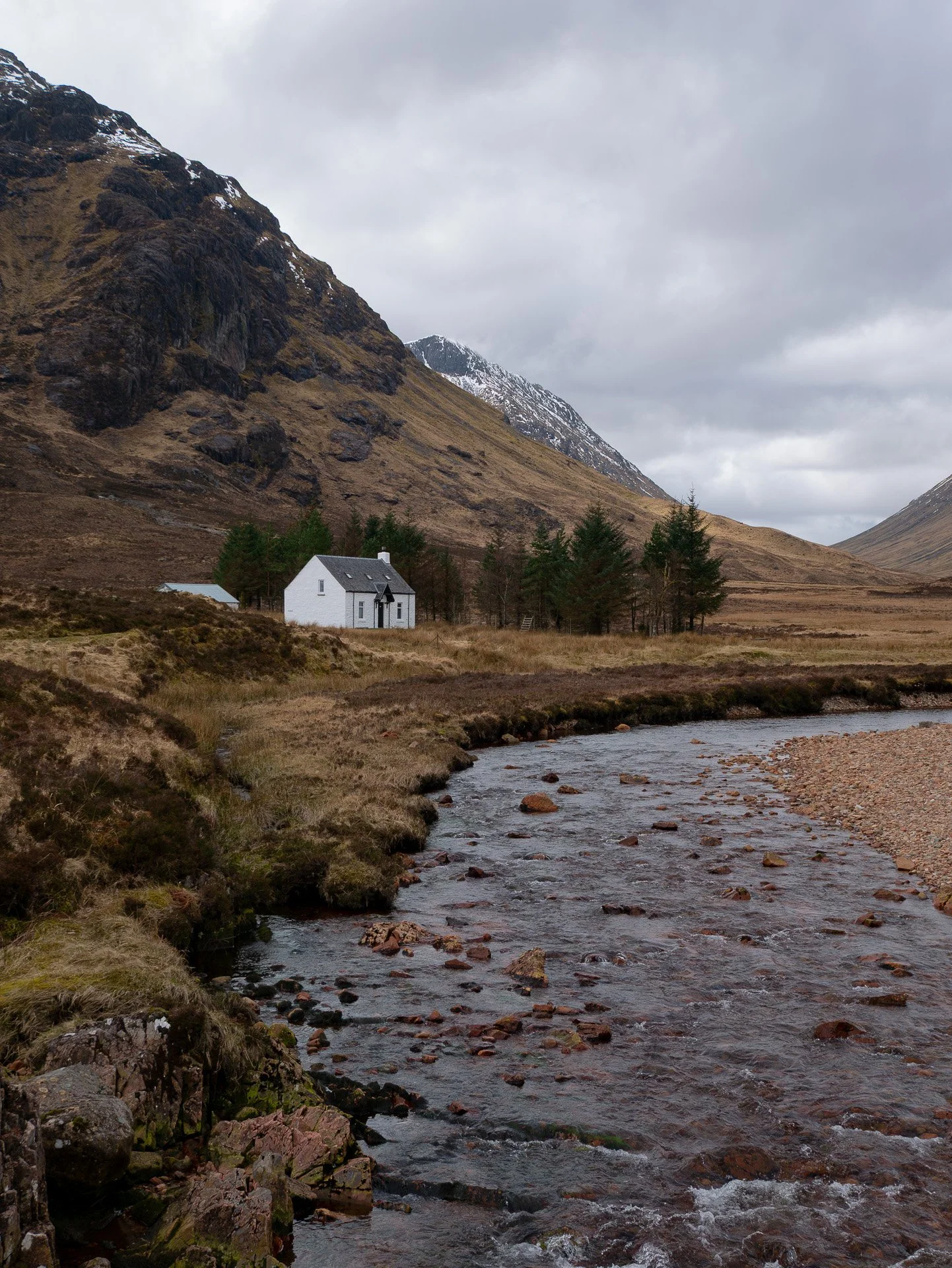 Wee white house in Glencoe Scottish Highlands
