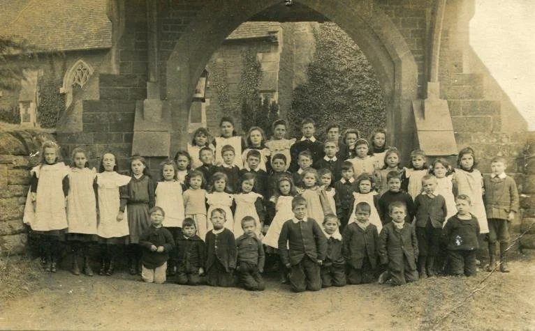 Oxenhall School’s children assembled at the church gates c.1910