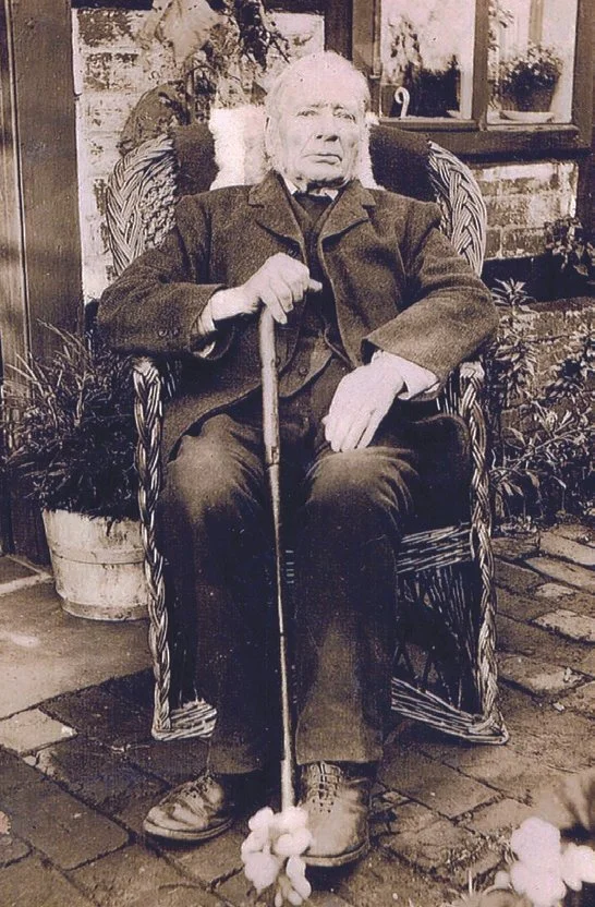 Charles Jones, the blacksmith, outside the old smithy in Holders Lane. Charles died in 1913 aged 85 having lost his wife Mary Ann in 1891 aged only 57