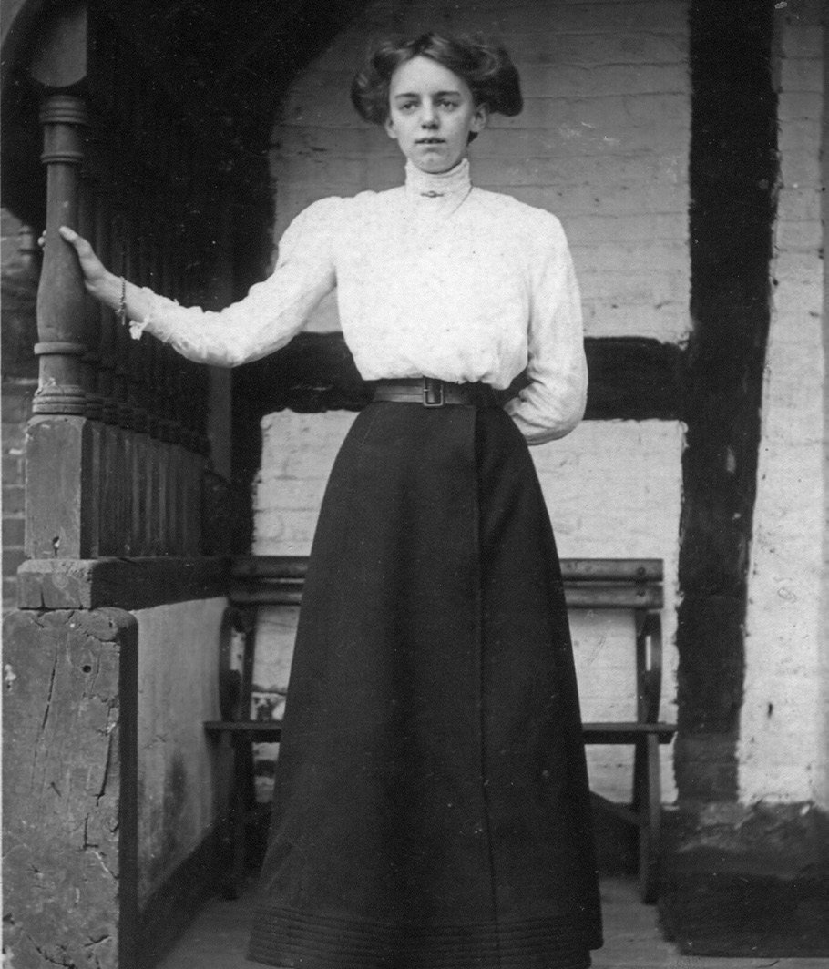 Kate Jones (b.1891) standing in the porch of Winters Farm
