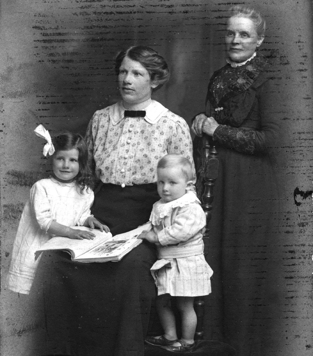 Mary Jones of White House Farm, second wife of Samuel Jones, with children Florence (Flossie), Wilfred, and Samuel's sister, Lydia.