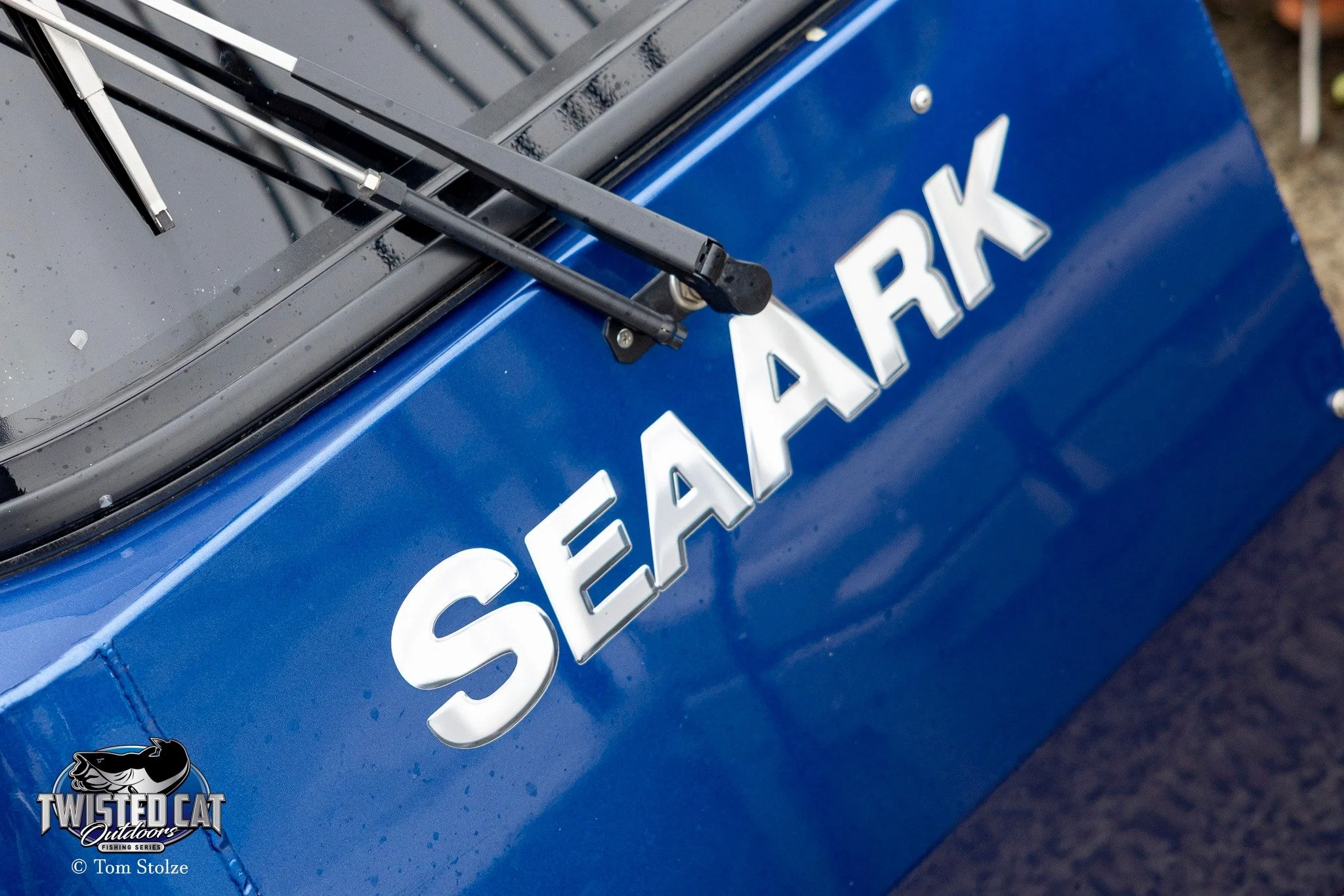 Close-up of a blue SeaArk boat.
