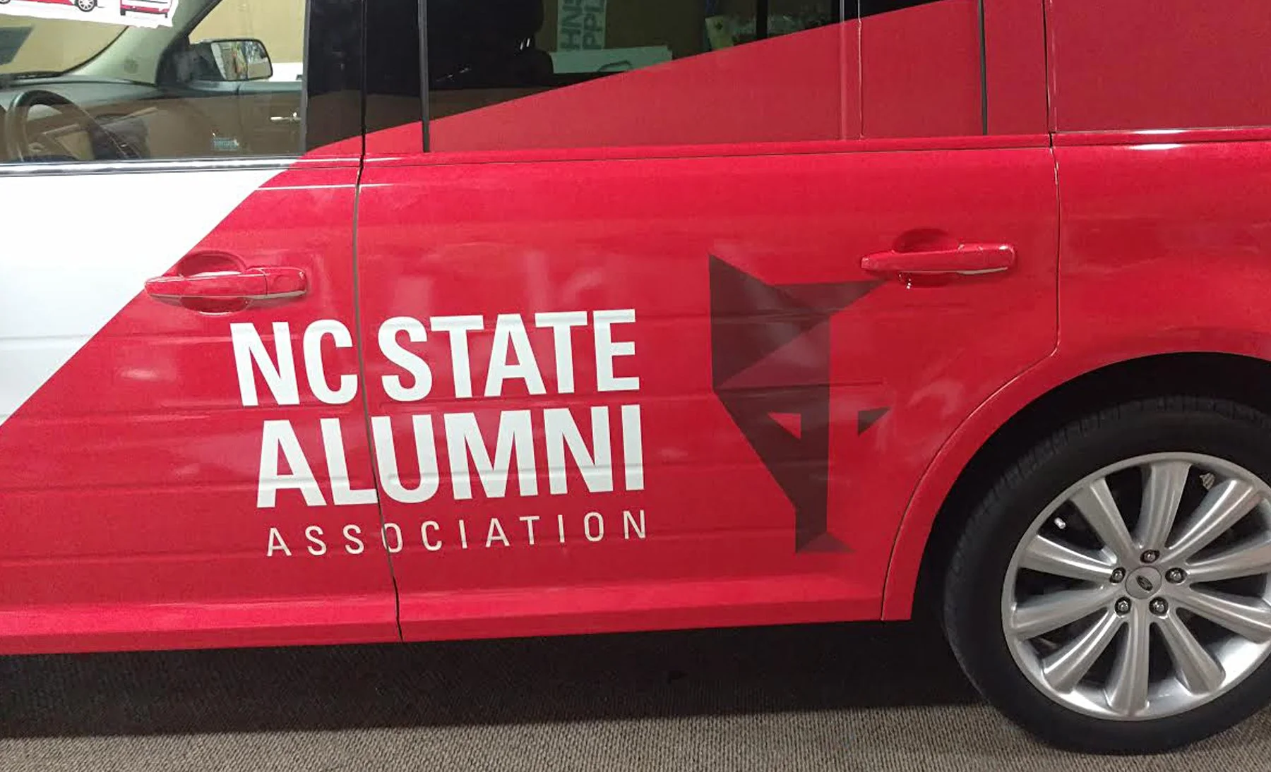 ncstate almuni_wide_carwrap.jpg