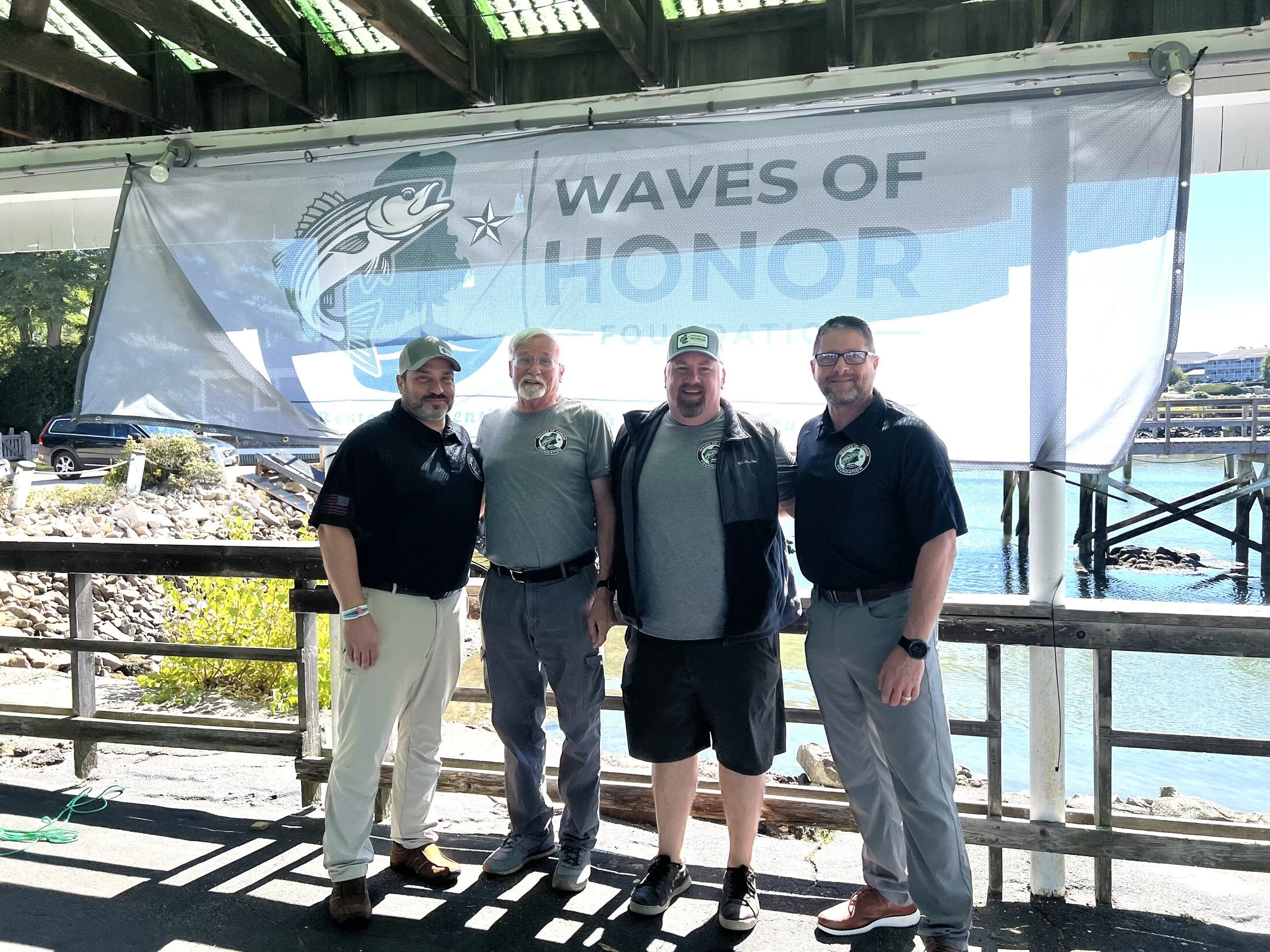 Guests and supporters on the dock at the opening of the first Waves of Honor retreat, York Harbor, August 31, 2026.