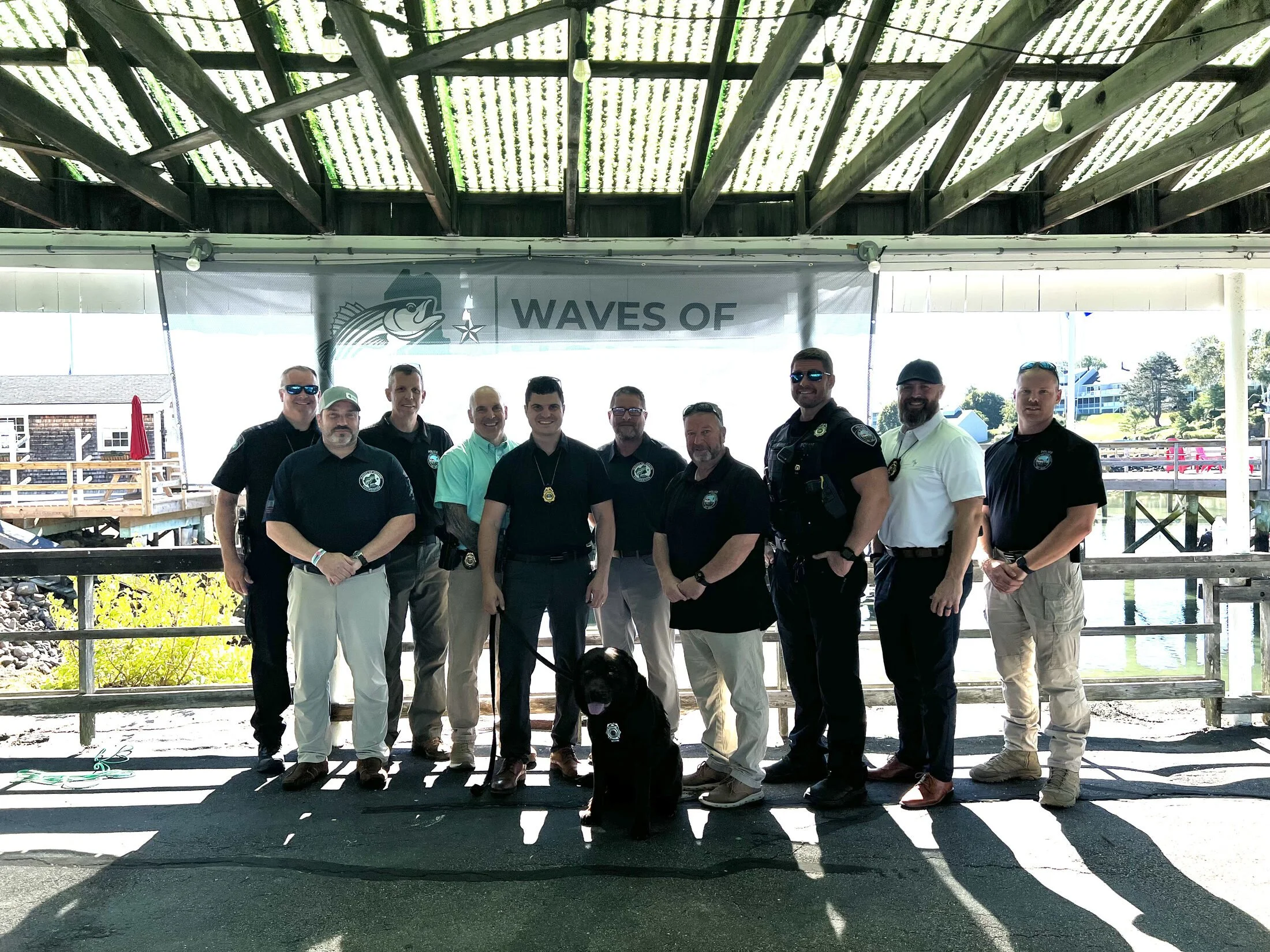Officers and supporters gathered under the Waves of Honor banner at the opening ceremony in York Harbor, August 31, 2026.