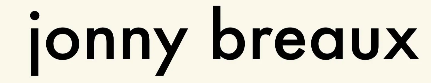 Jonny Breaux's official wordmark logo. Black text on light background