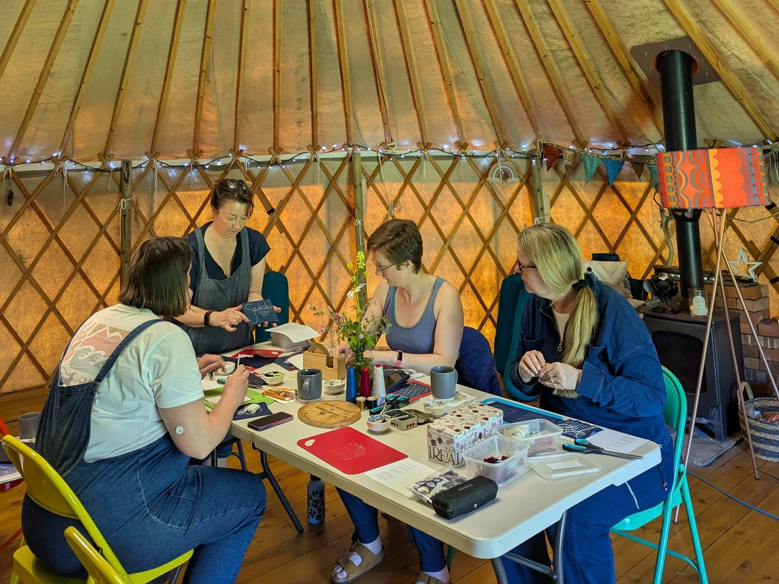 people crafting around a table